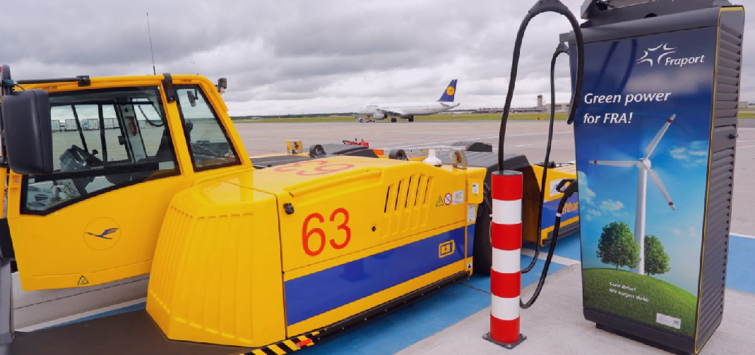 electric airport vehicle being charged